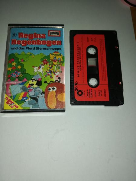 Regina Regenbogen Folge 2 und das Pferd Sternschnuppe 5-fach Schwarz geschraubt Schwarz mit Roten Aufkleber 31 692-7 Sonocord(Seite 1 der MC beschrieben)